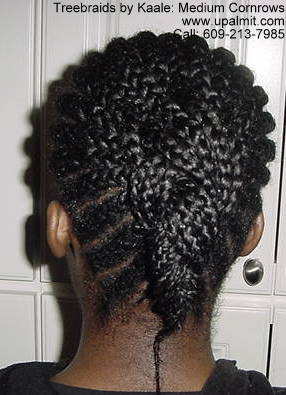 Cornrows with ponytail.