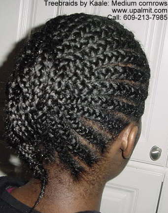 Cornrows with ponytail, right side.